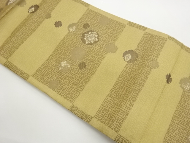 Nagoya obi woven with snowflake and water chestnut patterns in horizontal stripe